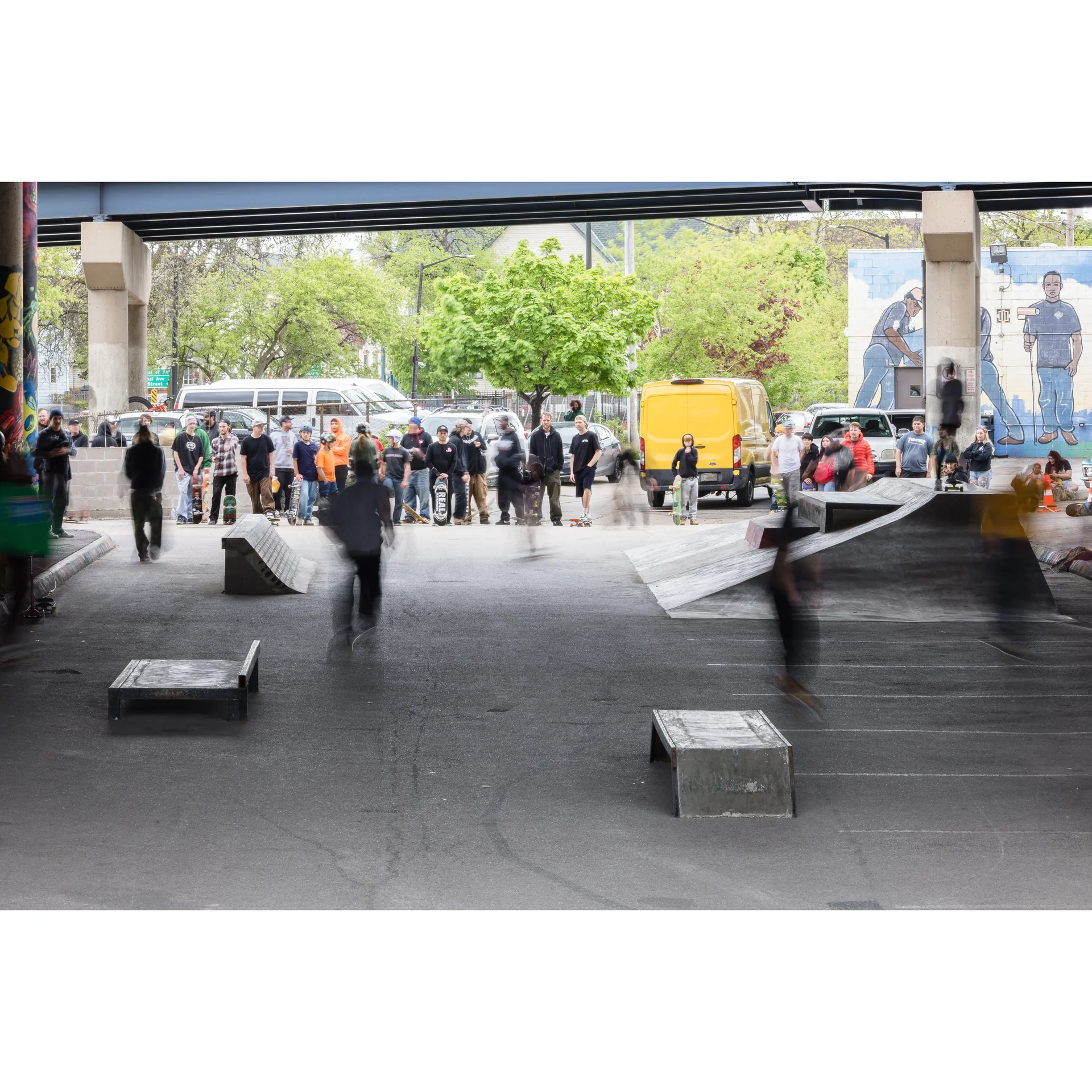 Wide photo of National DIY showing a number of skaters skating around. Photo by Peter Diatoni.